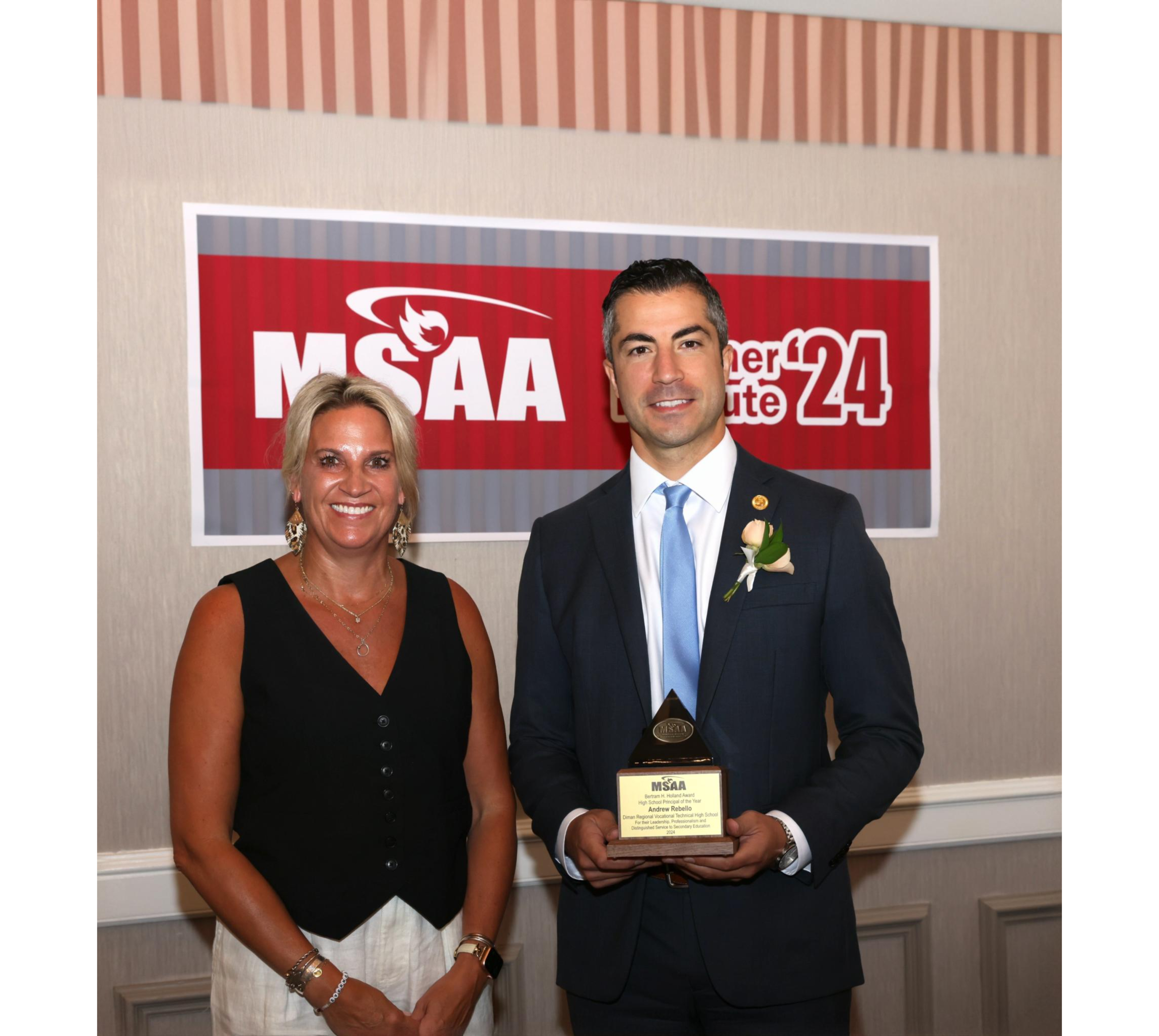 Andrew Rebello receiving award for MSAA High School Principal of the Year